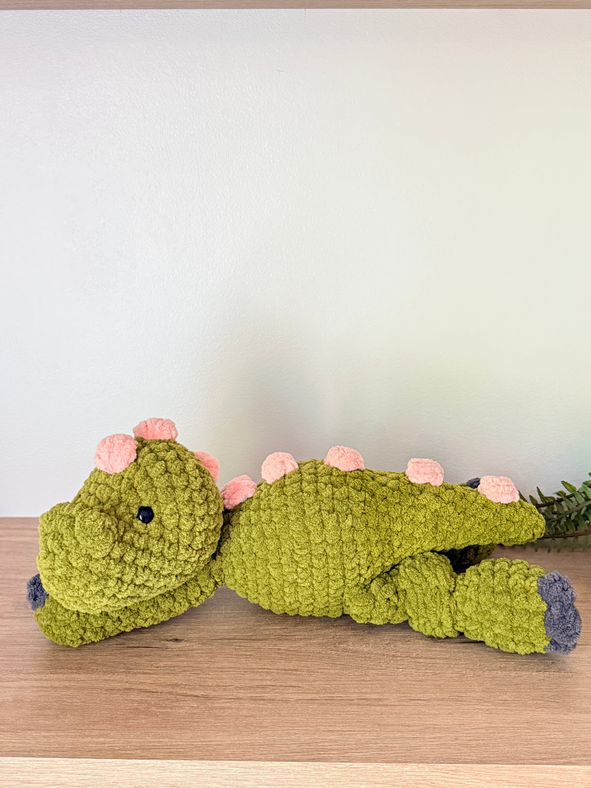 Handmade crochet dinosaur plushie