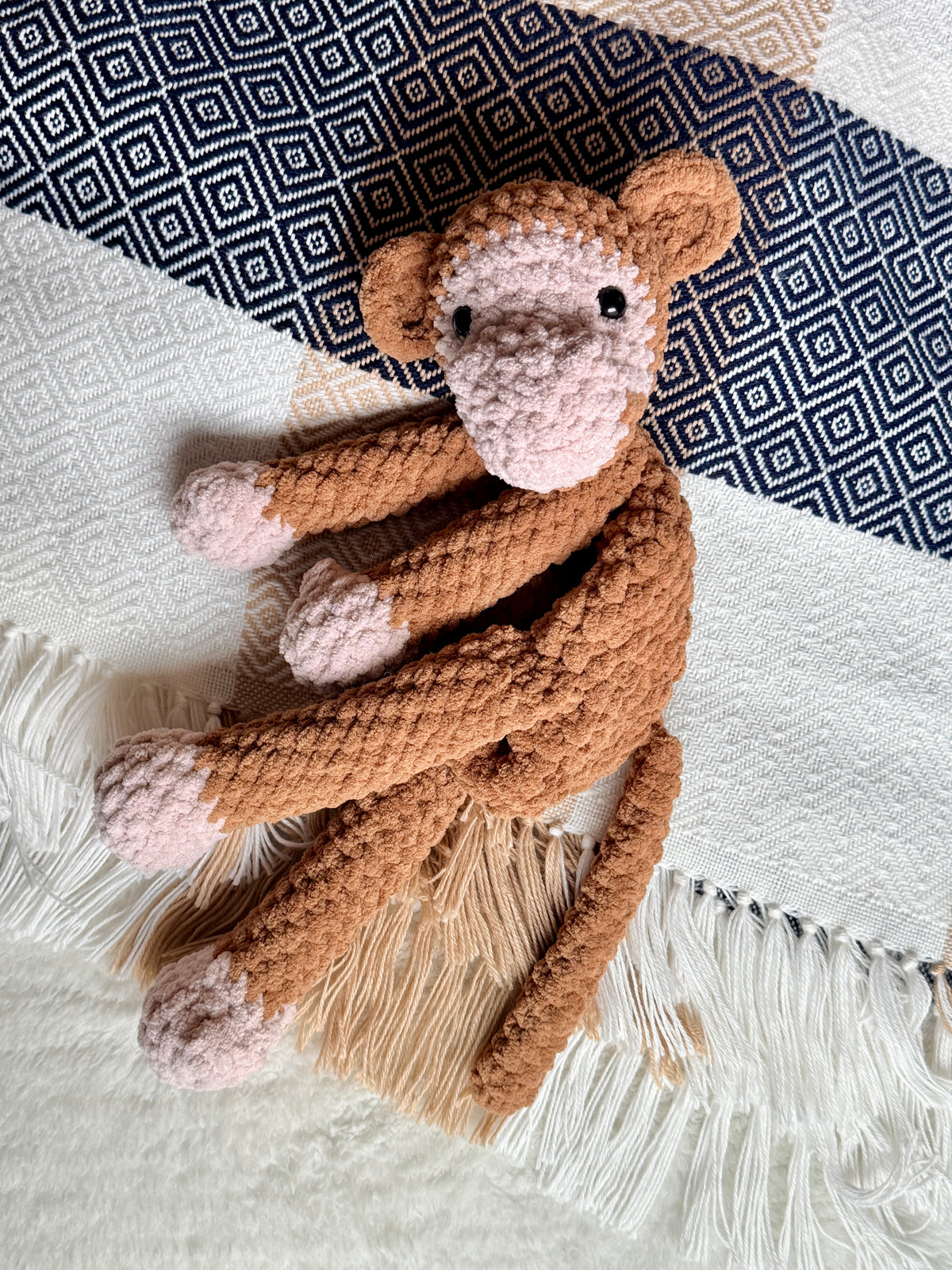 handmade monkey crochet snuggler